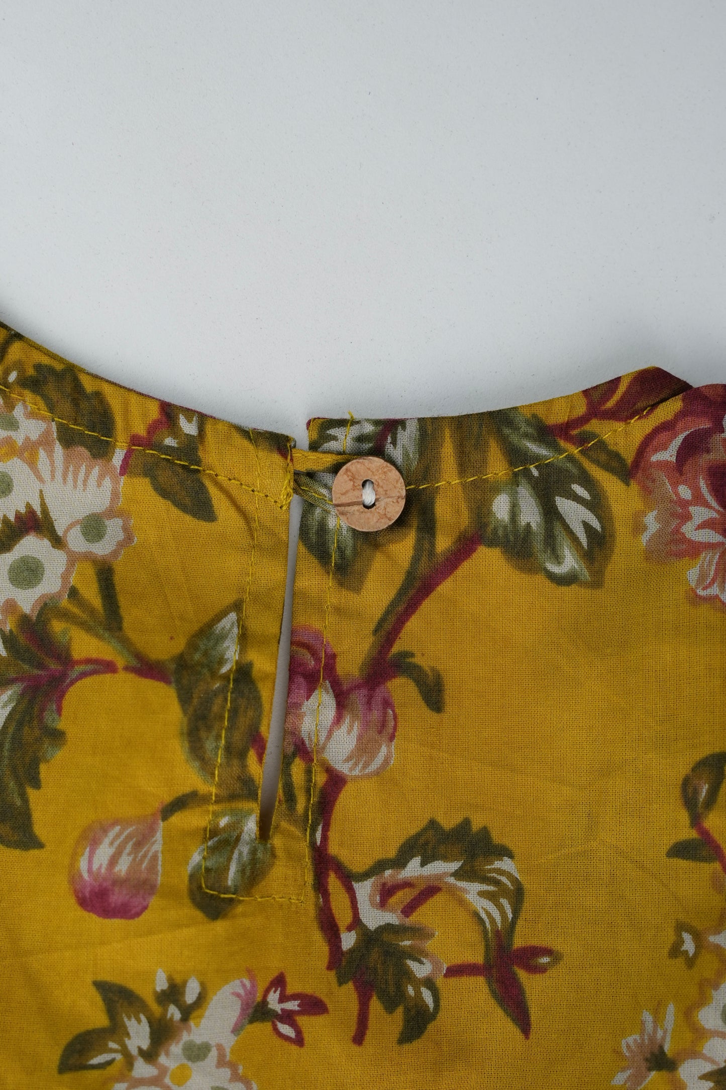 Mustard florals Angrakha suit for girls